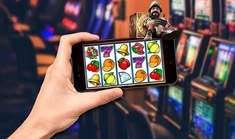 Queencasino casino presented on mobile device in Pakistan with slots and live games
